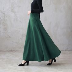 "This winter wool skirt is a classic piece of tailoring that will see you through rain or shine. It is cut with a flattering flared skirt to give you a wonderful shape. The winter skirt is perfect classic styling and ends at the ankle. This is a versatile skirt that you'll wear again and again. DETAILS: * More colors available https://etsy.me/3kURa6k * 30% wool, 30% fiber, 40% polyester * fully satiny liner * Two side pockets * Right zip closure * A little Back elastic, comfortable wear * Plus s Classic Green Pleated Skirt, Winter Full-length Pleated Skirt, Solid Full-length Skirt For Fall, Solid Full Length Skirt For Fall, Green Fitted Maxi Skirt For Winter, Full Length Skirt For Fall, Fitted Green Maxi Skirt For Winter, Green Flared Skirt For Winter, Green Long Skirt For Winter