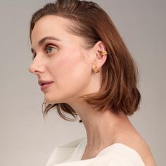 For pierced ears It does not come in pair It's a single earring Hand fabricated Gold is gold plated 18k over sterling silver Fine filigree Dimensions: 0.45" diameter Jewelry Gold Plated Ear Cuff, Gold 14k Ear Cuff With Matching Earrings, Yellow Gold Pierced Ear Climbers, Gold 14k Ear Cuff For Pierced Ears, Formal Gold Plated Ear Cuff, Gold Plated Ear Cuff For Formal Occasions, Formal Gold-plated Ear Cuff, Gold Huggie Ear Cuff With Matching Earrings, Gold Plated Ear Cuff With Ear Wire