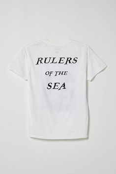 a white t - shirt with the words rulers of the sea printed on it