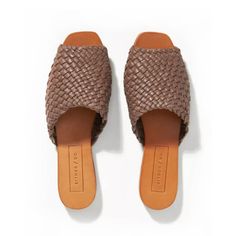 This item is final sale and not eligible for return or exchange. Read our return and exchange policy here and reach out if you have any sizing questions. The Woven Slide is the bestselling sandal of our collection - three years running. The deceptively simple upper is meticulously handwoven by an artisan collective in Medellin, Colombia. Each pair takes 24 hours to make from start to finish - the definition of slow fashion. Over time, the woven leather upper will become extremely soft for worn-i Luxury Summer Sandals With Intrecciato Weave, Luxury Evening Sandals With Woven Sole, Luxury Closed Toe Sandals With Intrecciato Weave, Woven Shoe, Ethical Shoes, Vacation Sandals, Pointy Shoes, Woven Leather Sandals, Huarache Sandals