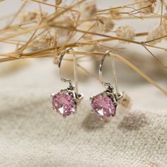 Unique Pink Cubic zirconia Drop Earrings, made of 925 Sterling Silver, Round Shaped, Fashion Jewelry for Women, Handmade By AditaGold.  These beautiful handmade pink cubic zirconia dangle earrings are made of silver and are carefully handcrafted at my workshop in Israel. Cubic zirconia is 's birthstone, and these gemstone silver drop earrings will be perfect for any occasion. They are classic and elegant and will add a beautiful sparkle to a day or evening look.  Item details   * A pair of Cubic Dazzling Crystal Earrings As A Gift, Dazzling Dangle Crystal Earrings With Prong Setting, Fine Jewelry Cubic Zirconia Crystal Earrings, Dazzling Crystal Earrings For Gift, Cubic Zirconia Hoop Earrings With Prong Setting As Gift, Elegant Pink Sterling Silver Diamond Earrings, Gift Crystal Earrings With Cubic Zirconia, Gift Crystal Diamond Earrings, Gift Cubic Zirconia Crystal Earrings