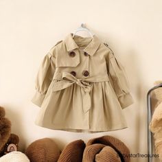 🌟Make your little one the trendsetter of the season with our Autumn Spring Cotton Baby Trench Coat! This must-have jacket is the perfect blend of fashion and function for your stylish toddler. 👗 Imagine your child stepping out in a coat that's as soft as it is durable, keeping them warm during those crisp autumn and spring days. Crafted from premium cotton, this trench coat is designed for comfort and style, making it the ultimate addition to any little girl's wardrobe. 💥Your baby deserves the best, and this coat delivers! The chic design not only protects against the elements but also turns heads wherever you go. It's more than just outerwear--it's a fashion statement! Perfect for any occasion, this coat makes an ideal gift for birthdays, holidays, or just because you care. 🛒 Don't le Cute Long Sleeve Beige Outerwear, Cute Beige Long Sleeve Outerwear, Cute Cotton Outerwear For Fall, Cute Long Sleeve Outerwear With Buttons, Cute Fall Outerwear With Buttons, Cute Cotton Outerwear With Buttons, Cute Cotton Outerwear With Button Closure, Cute Winter Outerwear With Buttons, Cute Long Sleeve Outerwear With Button Closure