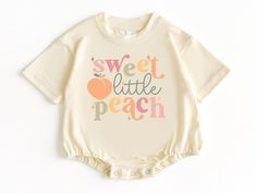 Sweet Little Peach T Shirt Bubble Romper, Baby Bodysuit, Baby Girl Outfit, Peach Birthday, Peach Baby Shower, Baby Gift, Baby Shower Gift 💗  Welcome to The WildflowerbyMiley Etsy Shop!  This listing is for the bodysuit, sweatshirt or t-shirt only. All other items that are shown in our photos such as shoes, hats, beanies, blankets etc. are for photo staging purposes and are NOT INCLUDED in the sale. DESCRIPTION:  This baby and children's unisex essential fits like a well-loved favorite. Super so Apricot Ideas, Little Peach Baby Shower Ideas, Peachy Baby Shower Ideas, Sweet Little Peach Baby Shower Ideas, Peaches Themed Nursery, One Sweet Peach Birthday Shirt, Georgia Peach Baby Shower, Baby Shower Planning Checklist, Peach Birthday