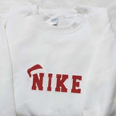 Santa Hat Christmas Embroidered Shirt Embroidered Cotton Christmas Sweatshirt, Casual Christmas Tops With Embroidered Graphics, Casual Embroidered Christmas Top, Winter Sweatshirt With Embroidered Logo, Holiday Embroidered Casual Sweatshirt, Casual Embroidered Holiday Sweatshirt, Casual Holiday Embroidered Sweatshirt, Casual Embroidered Sweatshirt For Holiday, Christmas Cotton Sweatshirt With Embroidered Logo