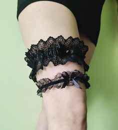 "Unique black garter set for the bride with a silk ribbon bow and a goldish thorn. Make your wedding day even more special with this two piece bridal garter set. DETAILS In the future I plan to make those garters to order to fit your actual leg measurements. But so far they are avaible in One size only. The lace band is stretchy, and it's also lined with elastic, which helps keep the garter in place. You can buy all set of garters or toss or keepsake garter only. SIZE - keepsake (big) garter wil Goth Garter Belt, Gothic Wedding Garter, Gothic Wedding Veil, Goth Garter, Black Wedding Garter, Veil With Bow, Bachelorette Headband, Black Bridal Veil, Black Bachelorette