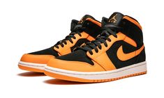 The Air Jordan 1 Mid never disappoints with versatile options and endless color combinations.  This particular silhouette features the brand’s “Orange Peel” colorway with classic black to provide the ultimate in contrast.  Black dresses the sneaker’s upper, tongue, laces and Jordan ball-and-wings logo, while orange is seen on the leather overlays, Nike Swoosh, and outsole.  With ample cushioning and a lot of style, the Air Jordan 1 Mid is a sneaker fan favorite. Air Jordan 1 Mid Orange, Jordan 1 Mid Orange, Jordan Orange, Air Jordan 1 Retro Mid, Jordan 1 Retro Mid, Nike Air Jordan 1 Retro, Wings Logo, Stadium Goods, Nike Swoosh