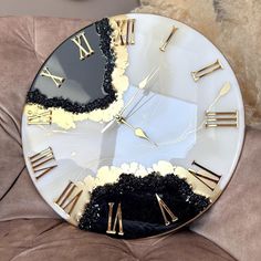 a clock that is sitting on top of a couch