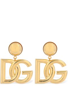 Width: 2.5cm Length: 4cm. Gold-colored brass. Logo detail . Clip-on closure . Nickel free Dolce Gabbana Jewelry, Dolce And Gabbana Earrings, Big Jewelry, Gold Clips, Gold Pearl Earrings, Earrings In Gold, Engraved Logo, Enamel Earrings, Brass Jewelry