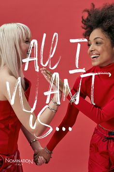 two women in red dresses holding hands with the words all i want is above them