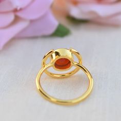 D E T A I L S - Metal: 925 Sterling Silver Stone: Natural Carnelian The fit: True to US ring size Finish: smooth and gold-Plated to a high shine S H I P P I N G & P R O D U C T I O N - My current production time is 2-6 business days, which means after those days are up, your order ships! I make everything custom to order, by hand, but I promise you it's worth the wait! R U S H - M Y - O R D E R - If you're in a rush to get your pretty new pieces, please send me a message and I'll let you kno Polished Open Moonstone Ring As Gift, Adjustable Ruby Ring With Bezel Setting, Gold Rings With Carnelian Gemstone, Gold Carnelian Gemstone Ring, Oval Carnelian Ring For Gift, Gold Carnelian Ring Jewelry, Gold Carnelian Ring For Wedding, Amber Birthstone Rings Fine Jewelry, Carnelian Gold Wedding Rings