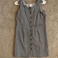 Selling The Plaid Sleeveless Button Up Dress From Tilly’s. It’s Cute And Never Worn!! You Can Wear It In Spring/ Summer In It’s Own Or Layer It With Black Or White Turtle Neck Or Long Sleeve Top In Fall/ Winter. Super Cute!! Overall Length (Shoulder To The Hem)- 30.5 Inches Chic Cotton Sleeveless Dress With Buttons, Sleeveless Cotton Dress With Button Back, Casual Black Sleeveless Dress With Buttons, Casual Cotton Sleeveless Dress With Buttons, Casual Sleeveless Mini Dress With Buttons, Fitted Casual Sleeveless Dress With Buttons, Fitted Sleeveless Dress With Buttons For Casual Wear, Casual Fitted Sleeveless Dress With Button Closure, Casual Sleeveless Dress With Buttons For Daywear