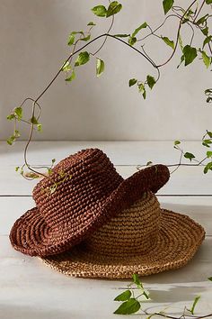 The true definition of an effortless essential, this handmade, wear-anywhere bucket hat is featured in a woven straw fabrication with slightly floppy brim for a forever classic style. **Features:** Hand-woven raffia straw fabrication, classic bucket style, floppy fit **Why We ❤ It:** This is a hand-crocheted raffia bucket made by a group of artisan women in Indonesia. Made with locally grown and harvested raffia, it is a truly packable design that is lightweight and durable. It can be shaped aft Cheap Handmade Vacation Hats, Bohemian Everyday Brimmed Sun Hat, Bohemian Brimmed Sun Hat For Everyday, Bohemian Hat With Curved Brim For Everyday, Bohemian Sun Hat With Curved Brim For Everyday, Bohemian Natural Hats For Everyday Use, Everyday Bohemian Brimmed Sun Hat, Everyday Bohemian Sun Hat With Curved Brim, Brown Woven Brimmed Bucket Hat