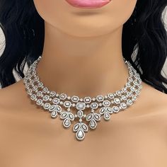 The Legacy diamond necklace features a important and emphatic design befitting a queen. It is stated, royal & elegant. Diamonds Shapes: Pear Shape, Marquise, Emerald & Round Total Diamonds Weight: 23.45 ct Diamonds Color: G - H Diamonds Clarity: VS (Very Slightly Included) Metal: 18K White Gold Metal Wt: 83.05 gmsSetting: Prong Set Length: 15.5 Inches Price Quoted may be negotiable. Please contact us to view and discuss. Modern Necklace Design, Diamonds Shapes, Expensive Necklaces, Diamond Necklace Wedding, Cocktail Necklace, Real Diamond Necklace, New Gold Jewellery Designs, Diamond Pendants Designs, Diamond Necklace Designs