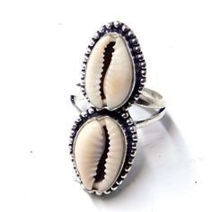 Weight of ring 5.5 Gm Head Sell Size 11x33 mm (APPROX.) 100% Cowrie shell natural stone, Metal:Sterling Silver Stamped:925 i make jewelry for a very special kind of Women's men's ,This stunning is handcrafted by one of our talented artisans. It is set in precious Fine Jewelry 925 Sterling Silver Jewelry, Polished to a brilliant luster> You can also contact us for a separate order, or place an order? Send items back within: 30 days of delivery Request a cancellation within: 2 Hours of purchase Beach Summer Jewelry Ring, Summer Beach Jewelry Ring, Summer Beach Ring Jewelry, Handmade Silver Round Shell, Handmade Oval Jewelry For Beach, Vintage Handmade Rings For Summer, Bohemian Midi Rings As Summer Gifts, Vintage Handmade Summer Rings, Silver Shell Rings For Beach