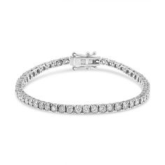 Elegante y clásico, este brazalete de tenis tiene un impresionante peso total en quilates de 3 quilates. Elaborado en brillante oro blanco de 14k, este brazalete está bellamente engastado con diamantes cultivados en laboratorio de talla redonda. Los diamantes están adornados en un engaste milagroso, dando a las piedras una ilusión de mayor tamaño. Esta pulsera se cierra con un cierre de caja para un ajuste seguro. Te encantará cómo esta pulsera de oro y diamantes brilla en tu muñeca. ¡Este es e Classic Tennis Bracelet In Diamond White With Diamond Cut, White Brilliant Cut Tennis Bracelet For Everyday Luxury, Everyday Luxury White Brilliant Cut Tennis Bracelet, Luxury White Jubilee Tennis Bracelet, Classic Diamond White Tennis Bracelet For Everyday Luxury, Timeless White Tennis Bracelet With Brilliant Cut, Diamond White Jubilee Tennis Bracelet, Classic White Gold Tennis Bracelet For Everyday Luxury, Luxury Everyday Brilliant Cut Tennis Bracelet