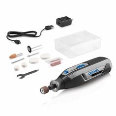 an electronic device with tools and other items on the white background, including a screwdriver