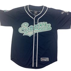 Vintage Seattle Mariners MLB jersey. Made in Korea. Stitched graphic. 90s. High-quality. Deadstock, never worn. Tagged as a medium. 22.5 inches pit to pit, 30 inches long. Excellent vintage condition. Smoke and pet free home. Throwback Team Jersey With Crew Neck, Throwback Team-colored Cotton Jersey, Varsity Jersey With Team Logo And Crew Neck, College Jersey With Team Logo And Crew Neck, Throwback Cotton Jersey For Sports Events, Streetwear Cotton Jersey With Team Name, Casual Team-colored College Jersey, Casual Team-colored Jersey For College, Cotton Team Jersey For Streetwear