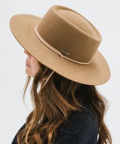 Wren's telescope crown lends a hint of Western style to a classic flat-brim shape. A hat versatile enough to pair with worn jeans to a linen dress. Wren features an adjustable leather chinstrap that gives it a little extra somethin' + can easily tuck into the crown for an additional look. Chic Adjustable Fedora With Flat Crown, Classic Felt Hat For Everyday Summer Wear, Classic Summer Felt Hat For Everyday, Everyday Brimmed Felt Hat For Summer, Classic Everyday Felt Hat For Summer, Everyday Summer Brimmed Felt Hat, Spring Everyday Fedora Felt Hat, Classic Flat Crown Felt Hat For Spring, Classic Spring Felt Hat With Flat Crown