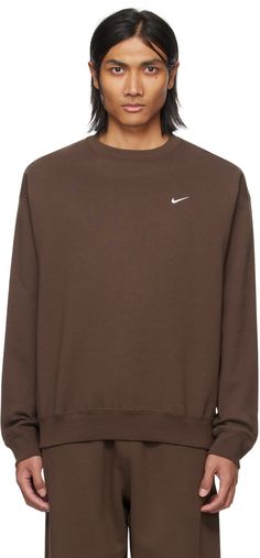 Cotton-blend fleece sweatshirt. · Rib knit crewneck, hem, and cuffs · Swoosh embroidered at chest · Dropped shoulders Please note that this item may be shipped only within North America. Supplier color: Baroque brown/White Nike Brown, Nike Outfits, Luxury Streetwear, Rib Knit, Cotton Blend, Women Wear, Crew Neck, Sweatshirts Hoodie, Perfect Clothing