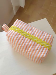 🌟 Stylish and Functional Quilted Orange Striped Makeup Bag 🌟 This elegant and practical makeup bag offers an eye-catching look with its blue quilted exterior design. This bag, which gains a modern touch with its thin striped pattern, is ideal for carrying your makeup items in an organized and safe manner. 🎨 Features and Details: * High-quality quilted linen blue fabric * Thin striped pattern * Zippered 💄 How to Use Your Bag? This makeup bag is a perfect option for your daily makeup routine. Quilted Toiletry Bag, Quilted Cosmetic Bag, Quilted Makeup Bag, Makeup Organizer Bag, Cute Makeup Bag, Custom Makeup Bags, Custom Makeup, Cute Makeup Bags, Daily Makeup Routine