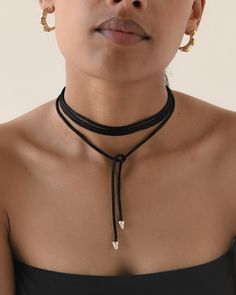 B L A C K ∙ C H O K E R This black silk thread choker, adorned with sleek silver pointed spikes at each end, elegant accessory that combines the softness of silk with edgy sophistication, making it a versatile piece for both casual chic and evening glam. Perfect for adding a touch of daring elegance to any outfit, whether paired with a cocktail dress or a casual blouse.  * Material:  Silk Thread and High Quality 925 Sterling Silver- Hypo-Allergenic and Nickel Free * Finish: 925 Sterling Silver w Minimalist Adjustable Necklace For Party, Adjustable Minimalist Necklace For Party, Adjustable Minimalist Party Necklace, Adjustable Clavicle Chain Choker, Minimalist Adjustable Choker, Adjustable Lariat Choker With Clavicle Chain, Adjustable Clavicle Chain Lariat Choker, Minimalist Adjustable Choker For Party, Adjustable Minimalist Choker For Party