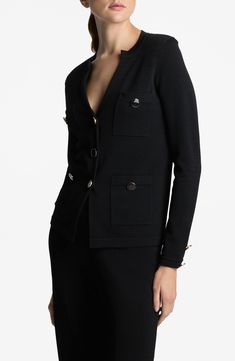 Crafted in a boxy silhouette with statement buttons, this sweater-jacket is knit to hold its shape, making it a year-round, year-after-year staple style. Front button closure Band collar Chest patch pockets; front patch pockets 68% viscose, 32% nylon Dry clean Imported Designer Clothing Luxury Black Sweater With Button Closure, Luxury Black Cardigan With Buttons, Designer Black Cardigan With Button Closure, Luxury Black Cardigan With Button Closure, Designer Fall Sweater For Work, Luxury Fall Sweater With Button Closure, Luxury Button Closure Sweater For Fall, Elegant Black Outerwear With Buttoned Pockets, Fall Workwear Sweater With Snap Buttons