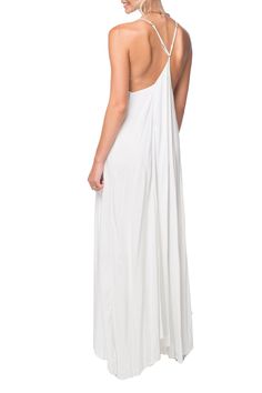 The Cross Back Leila Dress has strap sleeves that cross over in the back. The low scoop neckline is hand beaded with gold metallic beading. This dress is great to wear to the beach or as a sun dress. 100% Rayon Hand Wash in Cold Water Made in Bali All Sales Final