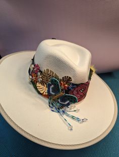 Beautiful Hand Made Shakira Beaded Hat Band with details on rhinestones and patches. *hat is not included*.  NOTE Ask for Wholesale price Fedora Hat Outfit Fall, Hat Embellishments, Rhinestone Hats, Fedora Hat Outfits, Sombrero Cowboy, Stylish Womens Hats, Beaded Hat Bands, Hat Bands, Jazz Fest