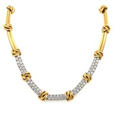 Estate Tiffany & Co. Knot Diamond Station Necklace in 18K Yellow Gold. The necklace features 3.90ctw of brilliant round diamonds. Then necklace is 15.5" in length, 8mm wide, and weighs 51.89 grams. Chloe 2024, Tiffany And Co, Station Necklace, Tiffany & Co., Earring Necklace, Ring Necklace, Luxury Jewelry, Precious Metals, Round Diamonds