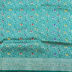 Category: Pure Katan Silk Fabric Khinkhwab brings you beautiful fabrics and yardage from Banaras. You can turn these beautiful fabrics into a traditional blouse, Indian kurta or a western jacket. For Blouse you need 1 meter of fabric, for kurta you need 3 meters, for jackets you need 2 meters of fabric. Pair these beautiful fabrics with your Banarasi sarees and dupattas and add more glamour to it. Fabric: Katan, a thread, prepared by twisting different numbers of silk fabrics as per requirements Traditional Blue Handloom Fabric, Eid Handloom Brocade Blouse Piece, Festive Bollywood Blouse With Woven Motifs, Unstitched Multicolor Brocade Blouse Piece, Bollywood Style Blouse Piece For Diwali With Woven Motifs, Bollywood Style Blouse Piece With Woven Motifs For Diwali, Bollywood Style Blouse Piece With Woven Motifs, Festival Chanderi Blouse With Woven Motifs, Festive Eid Blouse With Woven Motifs