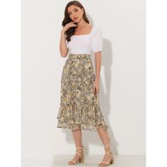 Featuring pretty ditsy floral prints, this midi skirt is a summer option that can be worn with just about anything. Channel elegant style in this midi skirt which is beautifully printed with a blossom pattern for a versatile look. It is made of lightweight fabric, adding definition to the free-flowing design. Falling to a waterfall midi hem, it sits high on the waist with a discreet side zip fastening. Summer days call for effortlessly feminine styles like skirts. Summer Floral Print Midi Bottoms, Flowy Summer Midi-length Bottoms, Knee-length Floral Print Summer Bottoms, Knee-length Floral Print Bottoms For Summer, Flowy Ruffled Midi Length Skirt, Knee-length Floral Bottoms For Summer, Floral Print Chiffon Skirted Bottoms, Feminine Midi Skirt For Summer, Summer Feminine Midi Skirt