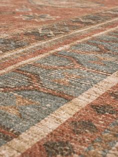 an area rug with many different colors and patterns