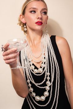 Description As quoted by Coco Chanel, "a woman needs ropes and ropes of pearls" and we delivered. This set is the epitome of a statement pearl necklace with earrings that are perfect together. Fashion cocktail jewelry set made with 10-line high quality pearl strands decorated with small and large pearls. Perfect for any special costume events. Size • Necklace respective lengths: 18' in., 20' in., 24' in., 28' in., 32' in., 34' in., 39' in., 42' in., 47' in., and 50 in. all connecting at each end Classic Pearl White Necklace For Party, Classic Pearl White Pearl Necklace For Party, Classic Pearl Embellished Necklaces For Party, Classic Pearl-embellished Necklace For Parties, Classic Pearl Necklace For Party, Classic Pearl Necklace With Pearl Chain For Parties, Classic Pearl White Jewelry For Party, Party Pearl White Pearl Necklace, Classic Pearl Drop Necklaces For Party