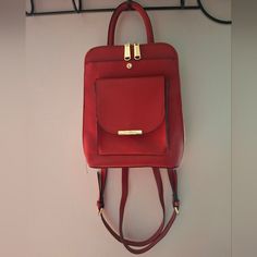 Steve Madden Red Bmarino Backpack *Nwot Excellent Condition Inside And Out *Adjustable Strap *Double Zipper Closure *Top Handle Strap *Gold Accented Hardware *Front Snap Closure Compartment *Front Flap Over Snap Closure Compartment *Interior Has Middle Zipper Close Compartment *Interior Has Zipper Pocket With 2 Open Slip Pockets *Signature Logo Lining Throughout *Measurements Are Approximately 10"L X 11"H X 3"W Red Leather Backpack With Zipper For Everyday, Red Leather Backpack With Adjustable Strap For On-the-go, Trendy Red Leather Backpack With Zipper Closure, Everyday Red Leather Backpack With Adjustable Strap, Red Backpack With Detachable Strap For Everyday Use, Red Leather Backpack With Adjustable Strap For Everyday, Trendy Red Leather Everyday Backpack, Trendy Red Rectangular Backpack, Red Bags With Adjustable Straps For Daily Use