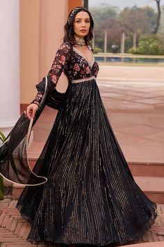 Black anarkali with floral and stripe patterns and sequin embellishments. Comes with scalloped border dupatta. - Aza Fashions Sequin Georgette Anarkali Set Maxi Length, Floor-length Sequined Anarkali Set For Eid, V-neck Anarkali Set For Eid Party, Maxi Length Sequined Anarkali Set In Georgette, Sequined Maxi Length Georgette Anarkali Set, Festive V-neck Dresses With Sheer Dupatta, Floor-length Sequined Salwar Kameez, Bollywood Style Sequined V-neck Dress, Bollywood V-neck Sequin Dress