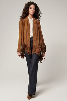 Bold and beautiful, the Trisha wrap jacket boasts 7" of fringe along its hem for movement and western-inspired style. Crafted from soft, supple goatskin suede leather, it can be worn two ways, both equally stunning: open, with the sides cascading down; or wrapped, with one side secured at the shoulder with a corozo button closure. Either way, you'll be the picture of rustic elegance. Featuring lined sleeves for comfortable wear. Wrap is 31 3/4" long plus 7" of fringe along hem. Fashion Drawing Tutorial, Suede Leather Jacket, Leather Jacket Style, Wrap Jacket, Silhouette Free, Bold And Beautiful, Todays Outfit, Rustic Elegance, Women's Coats & Jackets