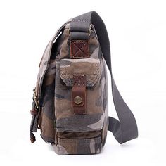 An eye-catching military inspired design, paired with the 100% cotton canvas fabric makes the Camo crossbody messenger bag as tough as can be. Great to bring on daily commutes, outdoor activities, and casual outings. Multiple exterior pockets allow quick access to your most frequently used items. A large interior provides ample storage for all your essentials. Crafted from 100% cotton canvas makes the bag remarkably tough, while the 100% genuine leather accents provide a touch of vintage charm. Bags Messenger, Cotton Canvas Fabric, Grey Camo, Leather Accents, Crossbody Messenger Bag, Military Inspired, Messenger Bags, Sling Backpack, Vintage Charms