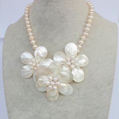 "Material:Natural white shell, FW pearl, lobster clasp Bead size: 6-7-8mm, 13*18mm,15*20mm Necklace size: 18\" + 2\" extension chain Color: White Packing: Beautiful Pouch All items in my shop are made to order. . Most of the time it takes 1-3 business days but can be longer at times and for larger orders. If you want to order of different style. Please contact me . ----------------------------------------------------- Please feel free to convo me should you have any question! Thank you! :)" White Shell-shaped Pearl Drop Necklace, White Shell Necklace With Pearl Pendant As Gift, Elegant Shell Necklace With Lobster Clasp, Pearl White Mother Of Pearl Shell Necklace Gift, Pearl White Mother Of Pearl Shell Necklace As Gift, White Mother Of Pearl Shell Necklace With Pearl Pendant, Gift White Mother Of Pearl Necklace, White Mother Of Pearl Necklace Gift, White Mother Of Pearl Necklace For Gift