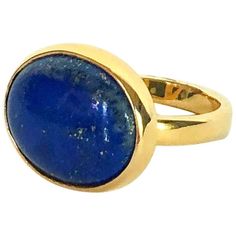 Marina J. Lapis Lazuli Ring with 14 Karat Yellow Gold Band | From a unique collection of vintage Band Rings at https://www.1stdibs.com/jewelry/rings/band-rings/. Modern Rings, Sapphire Eternity Band, Lapis Lazuli Jewelry, Gold Diamond Band, Lapis Ring, Turquoise Drop Earrings, Turquoise Earrings Dangle, Lapis Lazuli Ring, Lapis Lazuli Stone