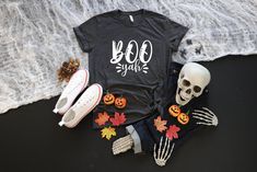 Boo Yah Halloween Shirt ,  Boo T-Shirts , Halloween Costume, Ghost Tee,Funny Gift Shirt,Halloween Party T-shirts Important Information Before Ordering: Check Size and Color Charts: Please review all size and color charts carefully before placing your order. Since each shirt is custom-made based on your selection, returns or exchanges are not accepted unless there's an issue with your order. Premium Quality Shirts: Our shirts are made with high-quality, super-soft, and comfortable fabric. We use top-of-the-line vinyl and a professional-grade heat press for each design. Processing and Shipping Times: Orders are processed within 1-3 days. Shipping times vary based on the shipping option you select at checkout. Variety of Brands: We work with different shirt brands depending on color and size Fun Halloween T-shirt Pre-shrunk, Fun Halloween Pre-shrunk T-shirt, Fun Pre-shrunk Halloween T-shirt, Halloween Fun T-shirt With Funny Text, Boo Costume, Party T Shirts, Ghost Tee, Halloween Boo, Halloween Kostüm