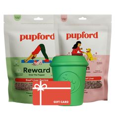 two bags of puppy food next to a green cup with a red bow on it