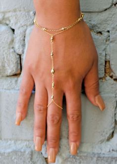 14kt Gold Fill Ball Hand Chain  ***This listing is only for the 14kt Gold ball hand chain. We styled this bracelet with other products in our shop to show Bracelet Ring Chain, Gold Hand Chain, Hand Chain Jewelry, Finger Bracelets, Hand Chain Bracelet, Ring Bracelet Chain, Mode Boho, Bracelet Friendship, Ring Chain