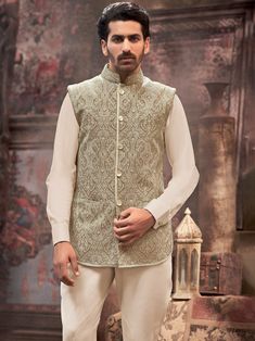 Traditionally crafted Beige color nehru jacket for your special occasions to make heads turn at you.This nehru jacket is crafted from Silk ifabric which is one of the softest and most luxurious fabric and addorned with the beautifully designed kashida thread emroidery all over, Nehru jacket,nehru jacket for mens,nehru jacket wedding,nehru jacket suit,designer nehru jacket,wedding nehru jacket COST INCLUDES NEHRU JACKET Luxury Nehru Jacket With Naqshi For Reception, Elegant Sherwani With Stand Collar For Transitional Season, Transitional Wedding Nehru Jacket With Stand Collar, Elegant Bandhgala With Stand Collar For Transitional Season, Festive Nehru Jacket With Stand Collar For Formal Occasions, Formal Festive Nehru Jacket With Stand Collar, Festive Formal Nehru Jacket With Stand Collar, Elegant Nehru Jacket With Stand Collar For Transitional Seasons, Wedding Bandhgala With Stand Collar For Eid