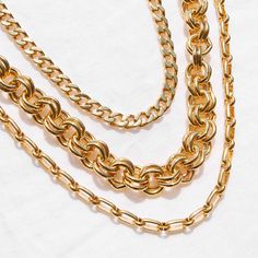 Surround yourself in elegance with the Ella Necklace. Crafted with a striking gold curb chain, this necklace is an effortless way to add glamour to your look. Feel beautiful and confident with this timeless piece of jewelry. Dare to stand out. Available in 14k gold plated or rhodium plated brass Chain width: 1/4" 16" flat curb chain with 2" extender Lobster claw closure SKU: BYN1258 Simple Chain Necklace, Stackable Necklaces, Gold Curb Chain, Two Necklaces, Modern Jewellery Design, Layered Chain Necklace, Layered Necklace Set, Wrap Necklaces, Gold Chain Necklace