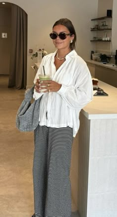 Horizontal Striped Pants Outfit, Striped Pants Outfit Black And White, Cool Trousers Outfit, Black And White Linen Pants Outfit, Wide Leg Trousers Outfit Spring, Stripe Set Outfit, Charleston February Outfits, Nice France Outfits Winter, Australia Fashion 2024