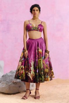 Purple skirt with floral pattern and elasticated waist. Paired with a matching bustier and peach self design shirt. - Aza Fashions Fitted Tiered Skirt Sets For Spring, Summer Floral Print Party Sets, Summer Party Floral Print Set, Feminine Silk Sets For Summer, Summer Party Silk Sets, Silk Party Sets For Summer, Chic Summer Sets With Tiered Skirt, Summer Party Sets With Long Skirt, Floral Print Dress With Flowy Flared Skirt