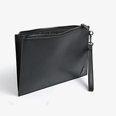 Carry all your most important items in style with this luxurious, leather clutch with embellished with a silver plaque. 100% Leather Classic Rectangular Clutch With Zipper Closure, Elegant Rectangular Clutch With Zipper Closure, Leather Clutch Evening Bag With Zipper, Rectangular Clutch With Zipper Pouch For Formal Events, Rectangular Clutch With Zipper Pouch For Formal Occasions, Modern Evening Pouch With Zipper Closure, Modern Evening Wallet With Zipper Closure, Formal Rectangular Clutch With Zipper Pouch, Classic Rectangular Clutch With Palladium Hardware