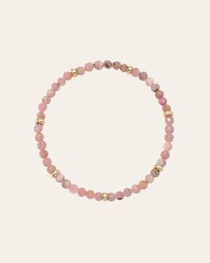 This 14K Gold Rhodochrosite Bracelet is segmented with 7 golden beads and textured pink stones, a combo that's sure to get hearts racing! This powerful combo is said stimulate love and passion while energizing the soul. Made in L.A. Stretch Fit Rhodochrosite Beads: Approx. 4mm Total Weight: Approx. 4g Ships in 6-9 business days Rush order ships in 3-5 business days Comes carefully packaged in a branded Zoe Lev protective sleeve. This item is Final Sale. See here for details. Pink Rose Quartz Gemstone Beaded Bracelets, Pink Rondelle Jewelry With Polished Beads, Pink Polished Rondelle Beads Jewelry, Pink Rondelle Beaded Bracelets, Hand-strung, Pink Rondelle Polished Beads Jewelry, Pink Rondelle Beaded Bracelets, Pink Rose Quartz Stretch Bracelet With Natural Stones, Pink Hand-strung Rondelle Beaded Bracelets, Pink Rose Quartz Natural Stone Stretch Bracelet