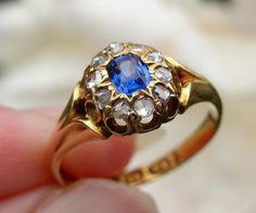 Free shipping!  This is an extremely beautiful Victorian blue sapphire and old cut diamond cluster ring. The vibrant royal blue sapphire of .33 carat is surrounded by a sparkly halo of SI, H/I  old rose cut diamonds. The diamonds total .2 carat. Like most antique rings, the gold has a real glow to it. The ring is perfectly proportioned, with graceful shoulders and is in excellent condition for its age.  Fully hallmarked.  Current retail value for age, diamond quality and content is au$3,450 as p Blue Sapphire Ring With Rose Cut Diamonds, Antique Blue Diamond Ring Hallmarked, Blue Sapphire Ring With Rose Cut Diamonds For Anniversary, Heirloom Blue Sapphire Ring With Rose Cut Diamonds, Anniversary Blue Sapphire Ring With Rose Cut Diamonds, Antique Blue Rings With Brilliant Cut, Antique Blue Brilliant Cut Ring, Antique Blue Diamond Ring With Rose Cut, Formal Blue Diamond Ring With Rose Cut Diamonds