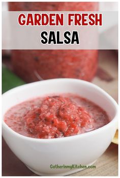 a white bowl filled with salsa and the words garden fresh salsa in front of it